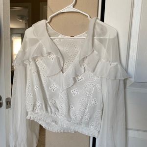 Free people. White puffy, see through shirt